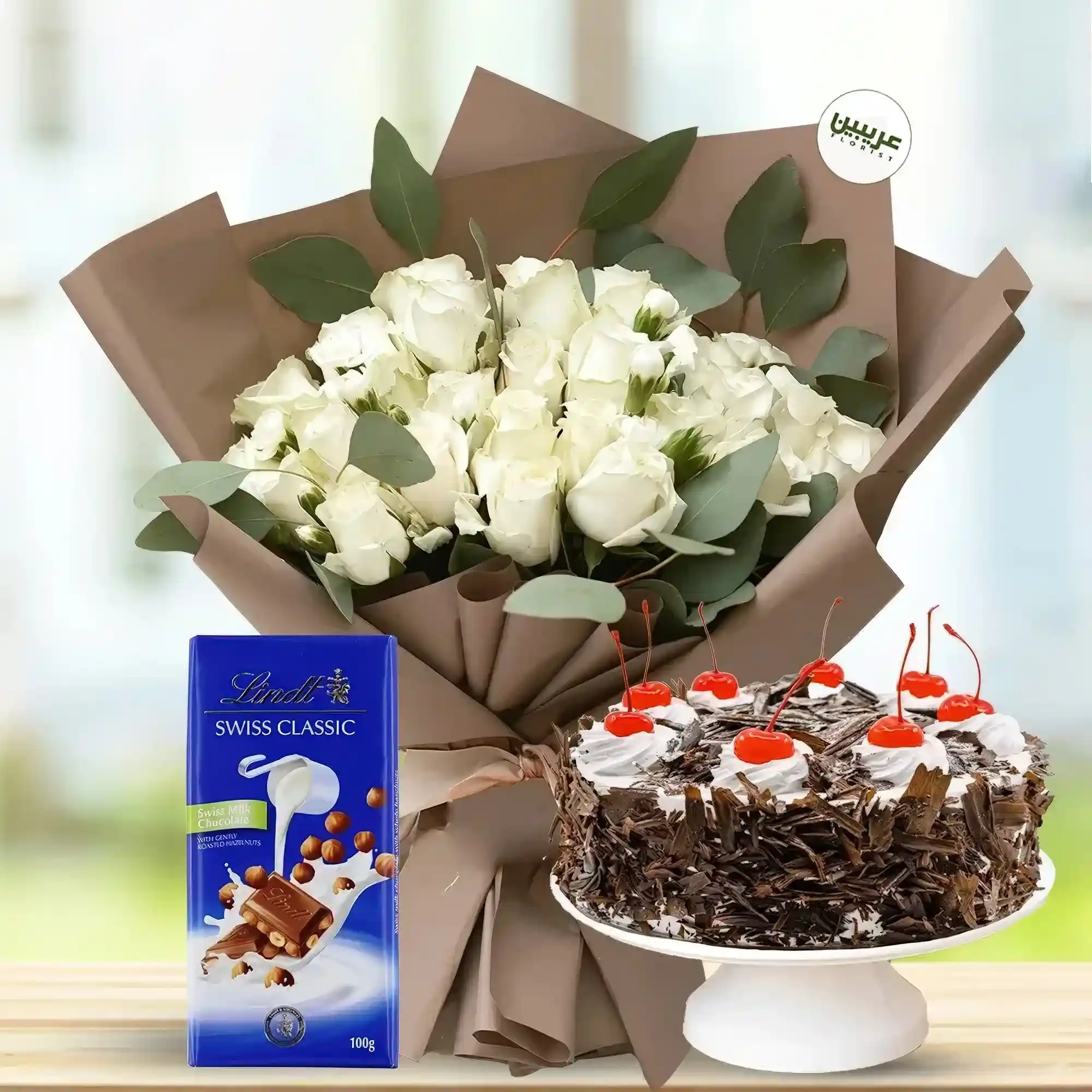 Bouquet Of 20 White Roses, Black Forest Cake & Lindt Chocolate